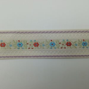 Tapacosturas bordado flores crudo