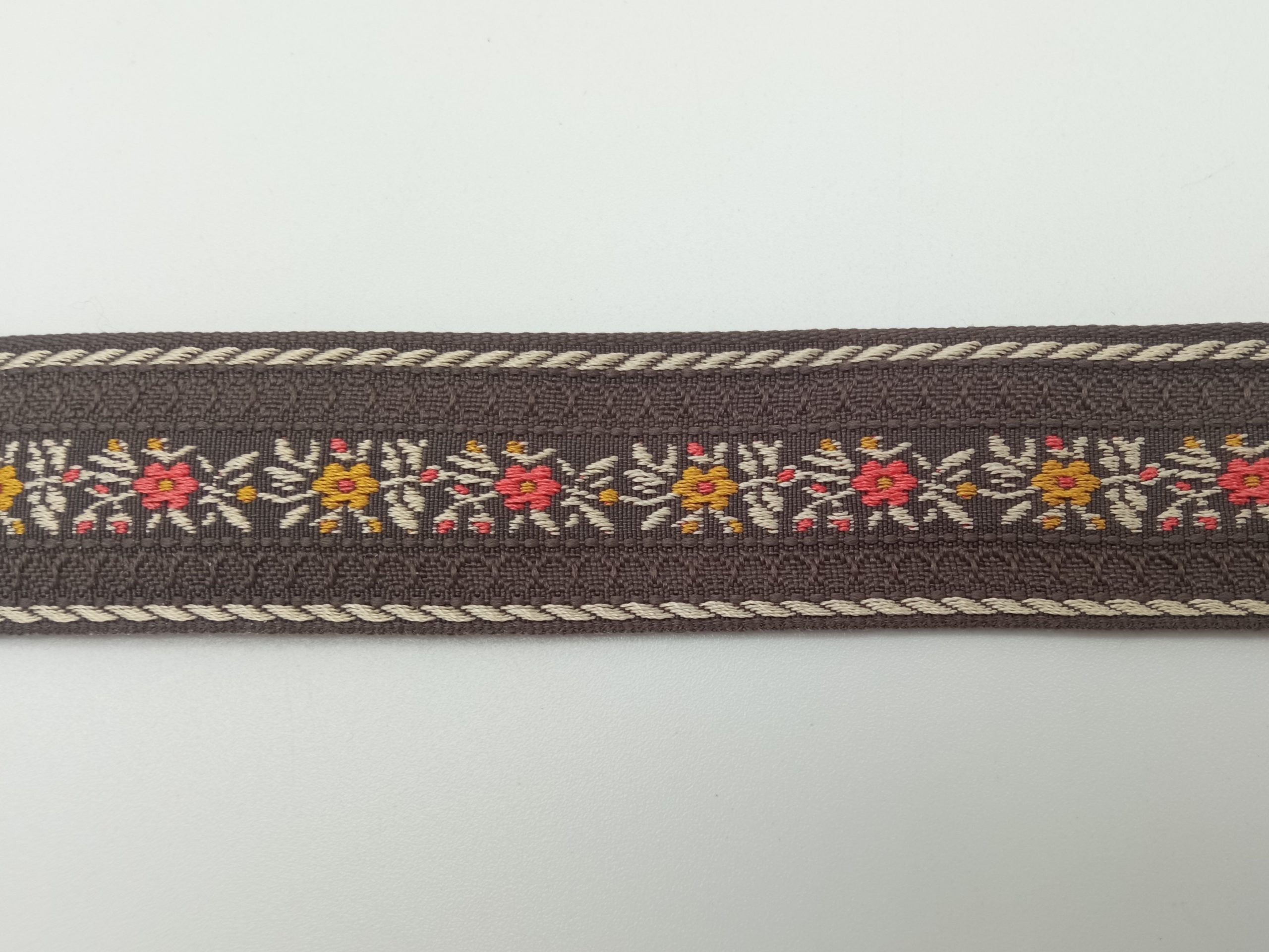 Tapacosturas bordado flores marrón
